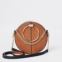 Beige ring handle circle cross body bag
